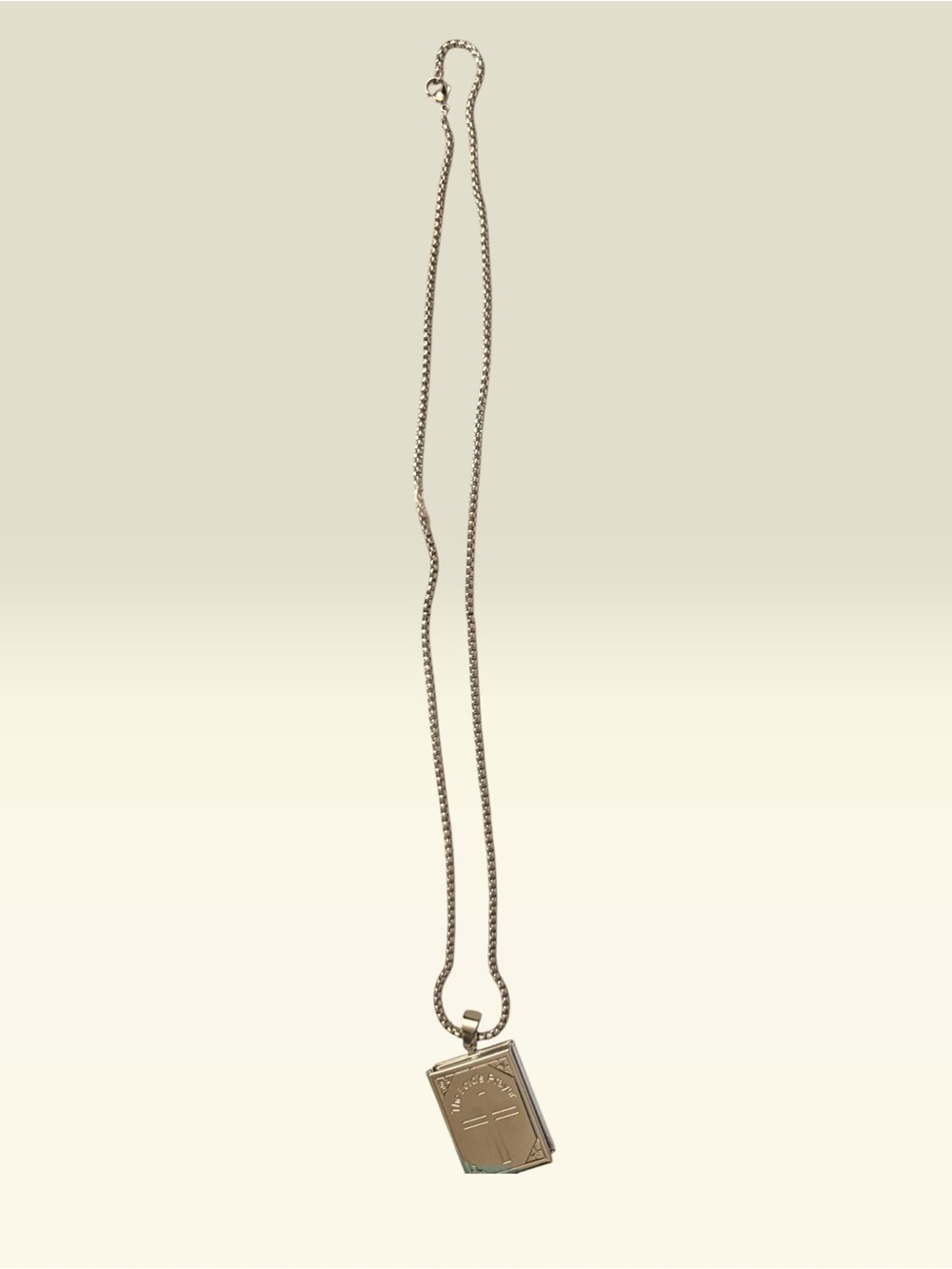 The Lord’s Prayer engraved locket and The Lord’s Prayer engraved ring. Stainless